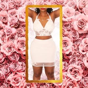 Two piece white top and skirt set